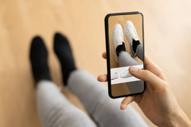 Woman Trying Virtual Sneakers In Shop Or Store AR App